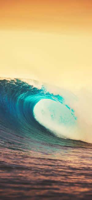 Surfers Captivating The Waves With Iphone Wallpaper