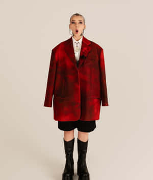 Surprised Fashion Modelin Oversized Red Jacket Wallpaper
