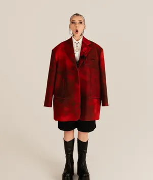 Surprised Fashion Modelin Oversized Red Jacket Wallpaper