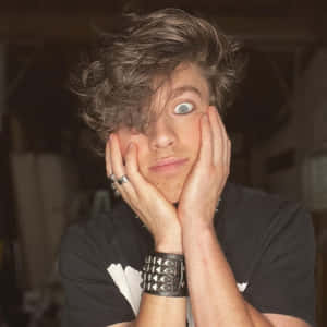 Surprised Young Man Portrait Wallpaper