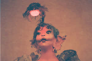 Surreal Fantasy Portraitwith Glowing Bulb Wallpaper