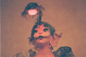 Surreal Fantasy Portraitwith Glowing Bulb Wallpaper