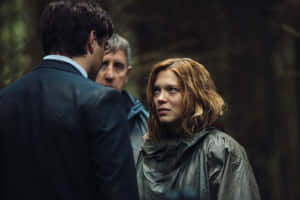 Surreal Sunset At A Lighthouse Wallpaper