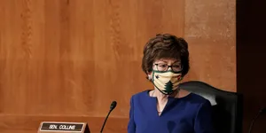 Susan Collins Christmas Mask Wallpaper