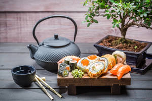 Sushi Platter With Black Teapot Wallpaper