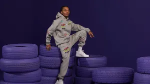 Swae Lee On Purple Tires Wallpaper