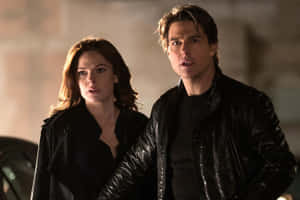 Swedish Actress Rebecca Ferguson And Tom Cruise Wallpaper