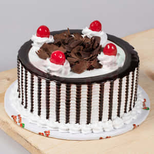 Sweet And Delicious Black Forest Cake Perfect For Any Occasion Wallpaper