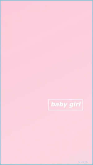 Sweet Baby Girl Wearing A Pink Dress Wallpaper