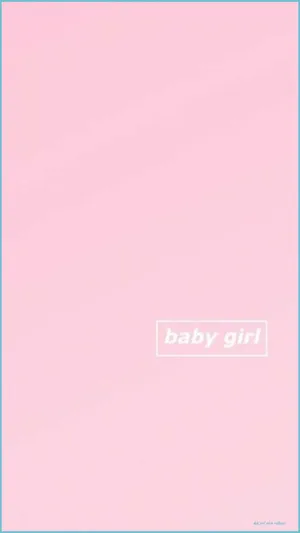 Sweet Baby Girl Wearing A Pink Dress Wallpaper