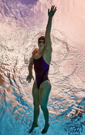 Swimmer Underwater Graceful Pose Wallpaper