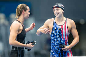 Swimmers Celebrating Victory Wallpaper