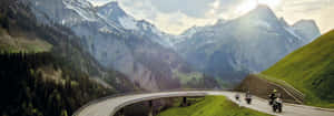 Swiss_ Mountain_ Road_ Motorcycle_ Journey.jpg Wallpaper