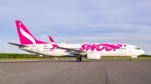 Swoop Aircraft At Runway Wallpaper