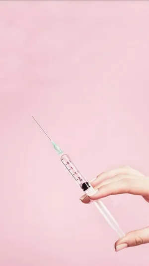 Syringeon Pink Background Wallpaper