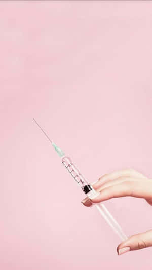 Syringeon Pink Background Wallpaper