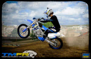 T M Racing Motocross Action Wallpaper