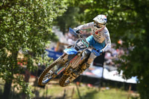 T M Racing Motocross Jump Action Wallpaper