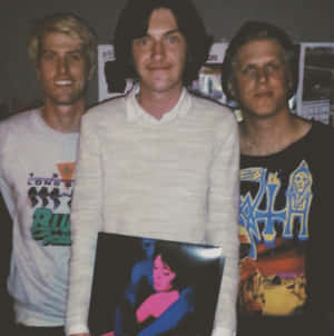 T V Girl Band Members With Vinyl Record Wallpaper