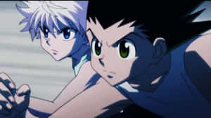 Tag Team Duel - Killua And Gon Fight Together Wallpaper