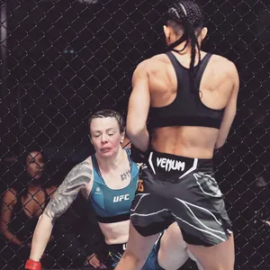 Taila Santos Looking At Calderwood Wallpaper