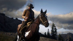 Take A Ride Into The Wild West With Horse Red Dead Redemption 2 Wallpaper