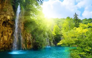Take A Trip To Plitvice National Park, Croatia, To Experience The Mesmerizing Beauty Of The Peaks And Valleys Of This Incredible Waterfall. Wallpaper