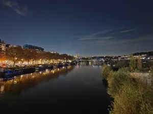 Take In The Beauty Of Night Mode And Explore The City Lights. Wallpaper