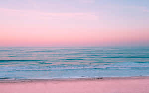 Take In The Breathtaking Beauty Of Pastel Beach Wallpaper