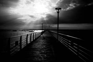 Take In The Breathtaking Beauty Of The Mediterranean Sea Along The Pier In Saint-jean Cap-ferrat, France Wallpaper