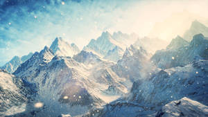 Take In The Breathtaking View Of The Snow-capped Mountain Wallpaper