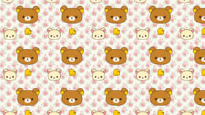 Take Your Favorite Bear Along As You Go With The Rilakkuma Laptop! Wallpaper