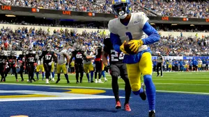 Talented Wide Receiver In Action Wallpaper