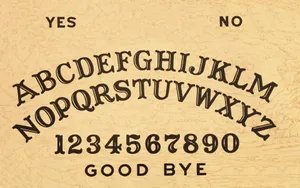 Talk To The Spirits Through An Ouija Board Wallpaper