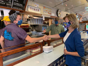 Tammy Baldwin In Diner Wallpaper