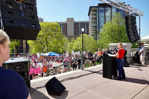 Tammy Baldwin On Rally Stage Wallpaper