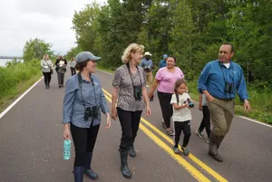 Tammy Baldwin With Binoculars Wallpaper