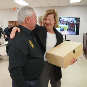 Tammy Baldwin With Wooden Box Wallpaper