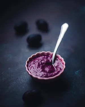 Tasty Java Plum Jam In A Glass Bowl Wallpaper