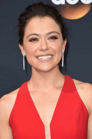 Tatiana Maslany Red Dress Event Wallpaper