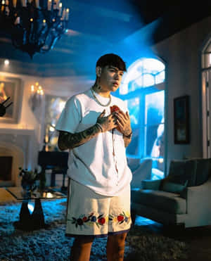 Tattooed Man Holding Heart Wallpaper