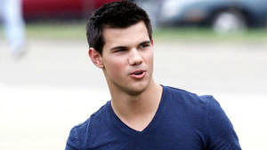 Taylor Lautner Looking Away Wallpaper