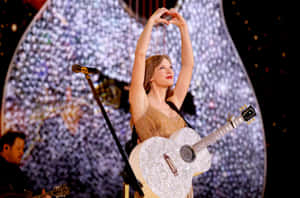 Taylor Swift Concert Heart Gesture Wallpaper