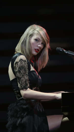 Taylor Swift Iphone Playing Piano Wallpaper