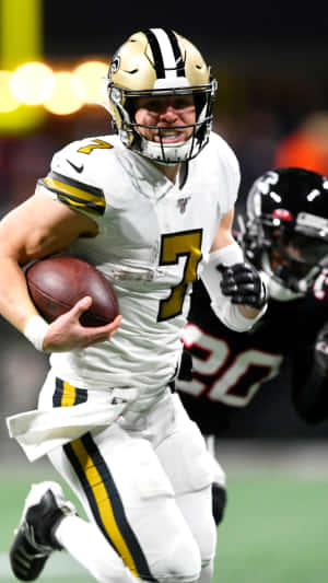 Taysom Hill New Orleans Saints Action Run Wallpaper