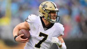 Taysom Hill New Orleans Saints Action Shot Wallpaper