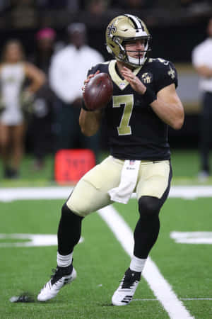 Taysom Hill New Orleans Saints Quarterback Action Wallpaper