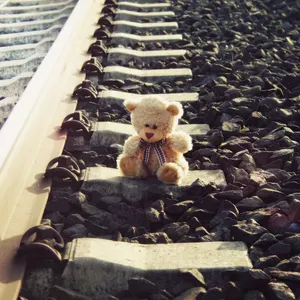 Teddy Bear On Railroad Tracks Wallpaper
