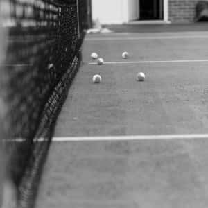 Tennis Balls Near Net Monochrome Wallpaper