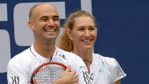 Tennis Legends Steffi Graf And Andre Agassi Together Wallpaper